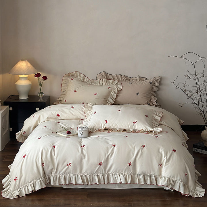 Luxurious bed linen set with ruffles and embroidered bows