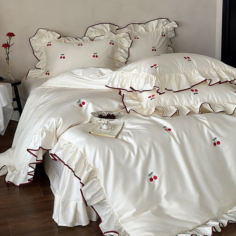 Luxury bedding set made of cotton satin with ruffles and cherry embroidery