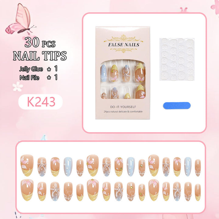 Artificial nails with floral motifs and glitter details Kalsten