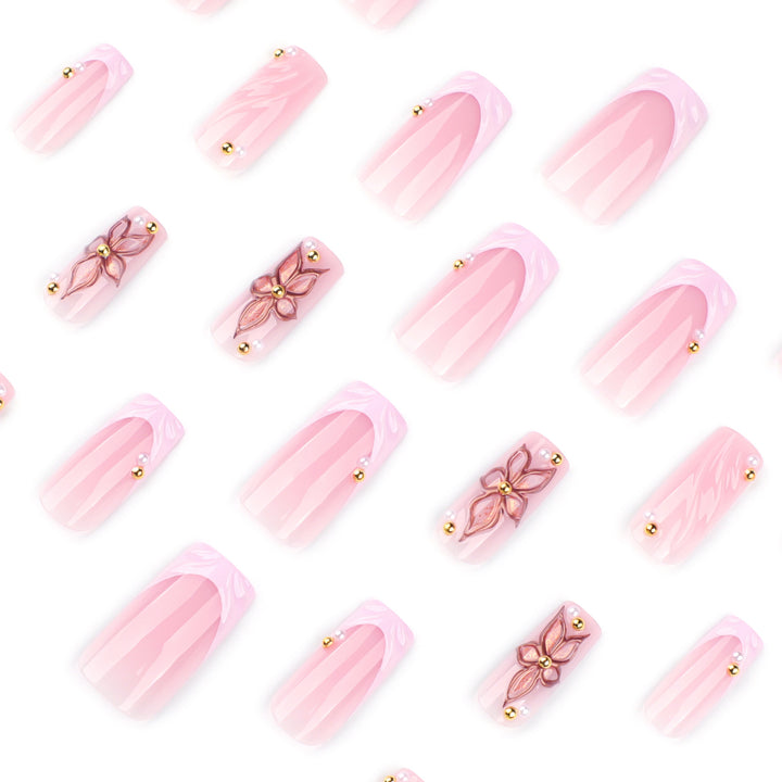 Artistic acrylic nails with flower design and glitter variations Kalsten