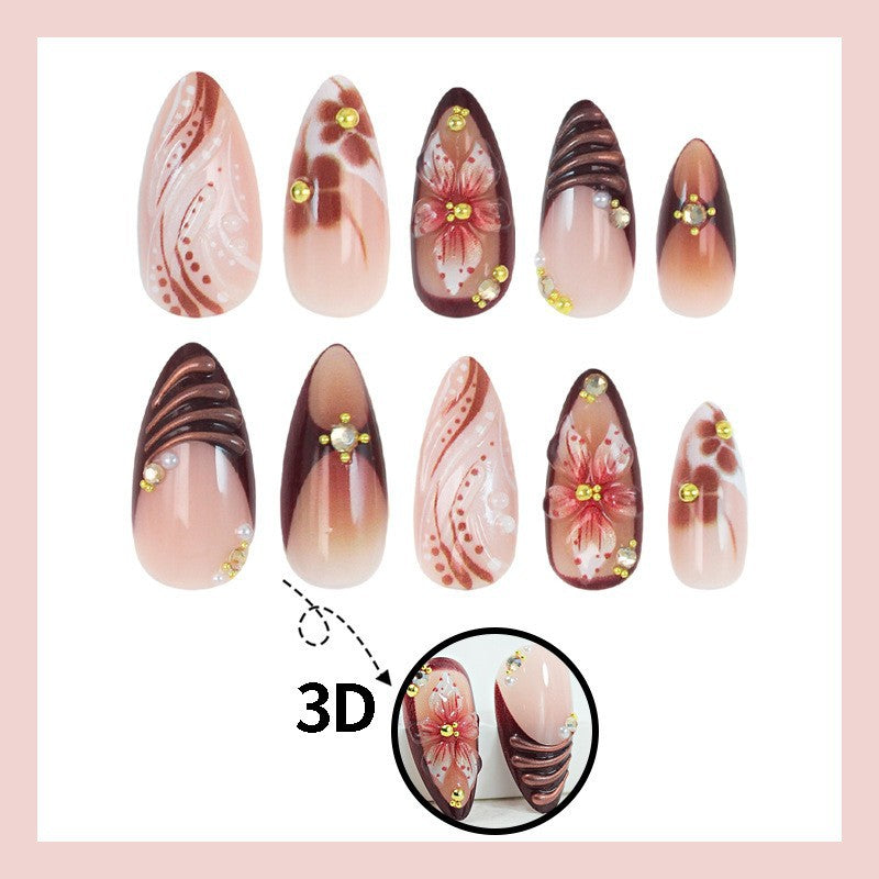 Acrylic nail set with elegant 3D flower accents and glamorous designs Kalsten
