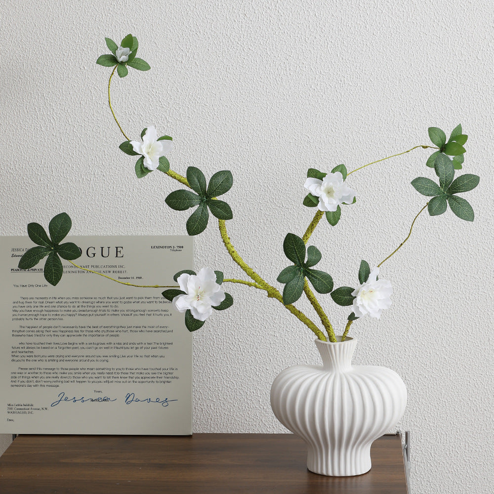 More elegant artificial flower branch with realistic blooms and leaves