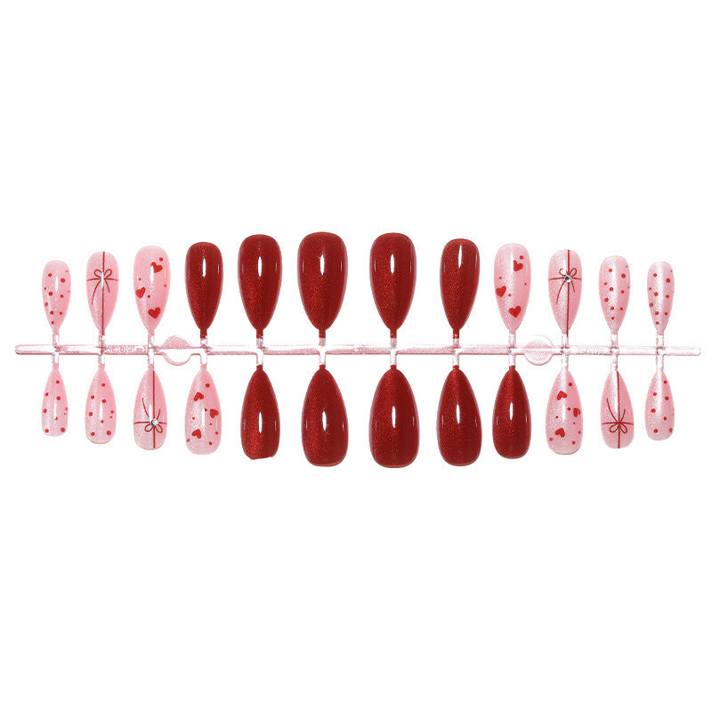 Artificial nail set with romantic heart and glitter designs Kalsten
