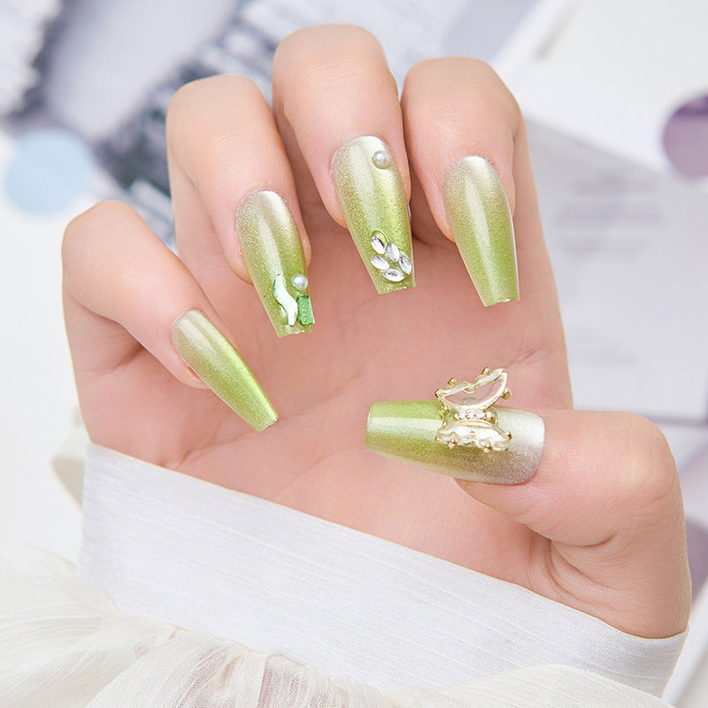 Artificial nails with butterfly accents and glitter details Kalsten