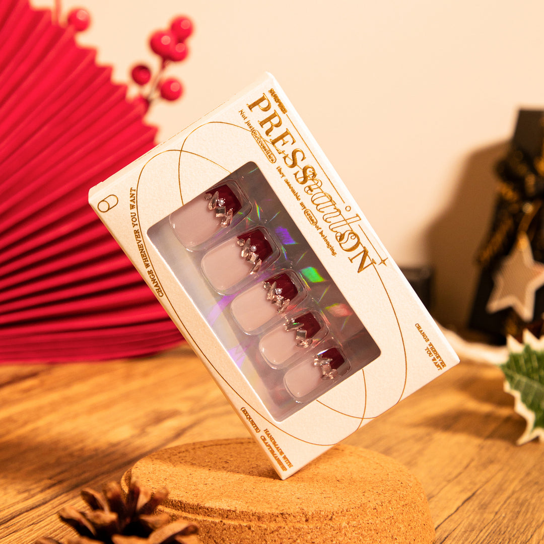 Artful nail extensions with glitter and jewelry embellishments Kalsten