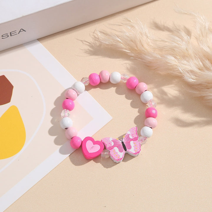 Playful bracelet with heart and butterfly charms Kalsten