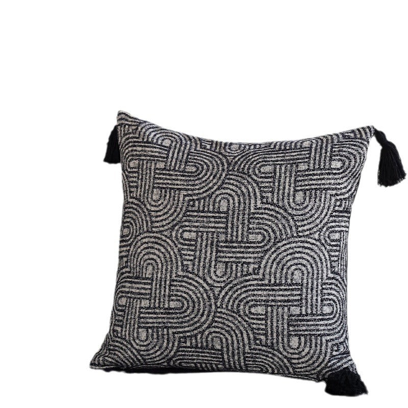 Square cushion cover made of textured bouclé weaving with geometric relief and corner tassels Kalsten