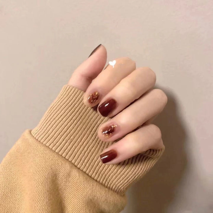 Artistic Press-On Nail Set with Gold Accents
