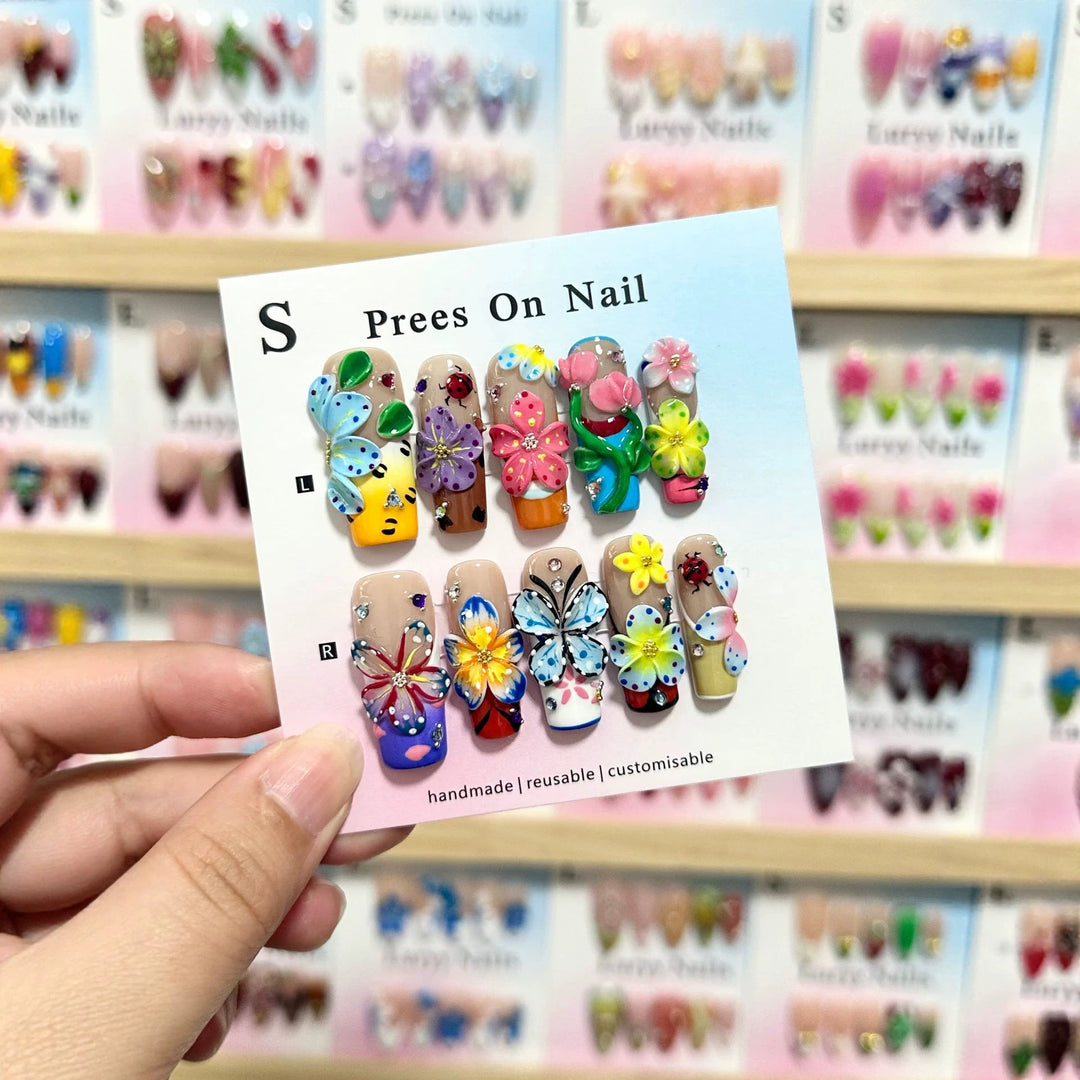 Artistic Press-On Nail Art Set with Vibrant Flower and Butterfly Designs