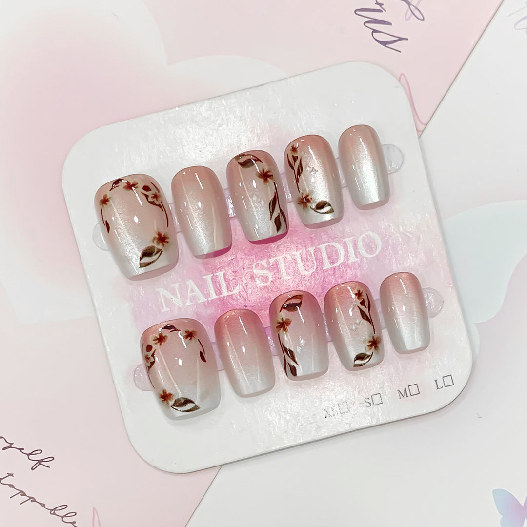 Artistic nail tips with floral accents Kalsten