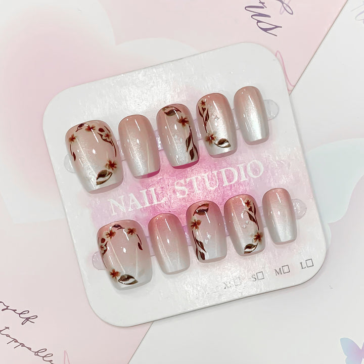 Artistic nail tips with floral accents Kalsten