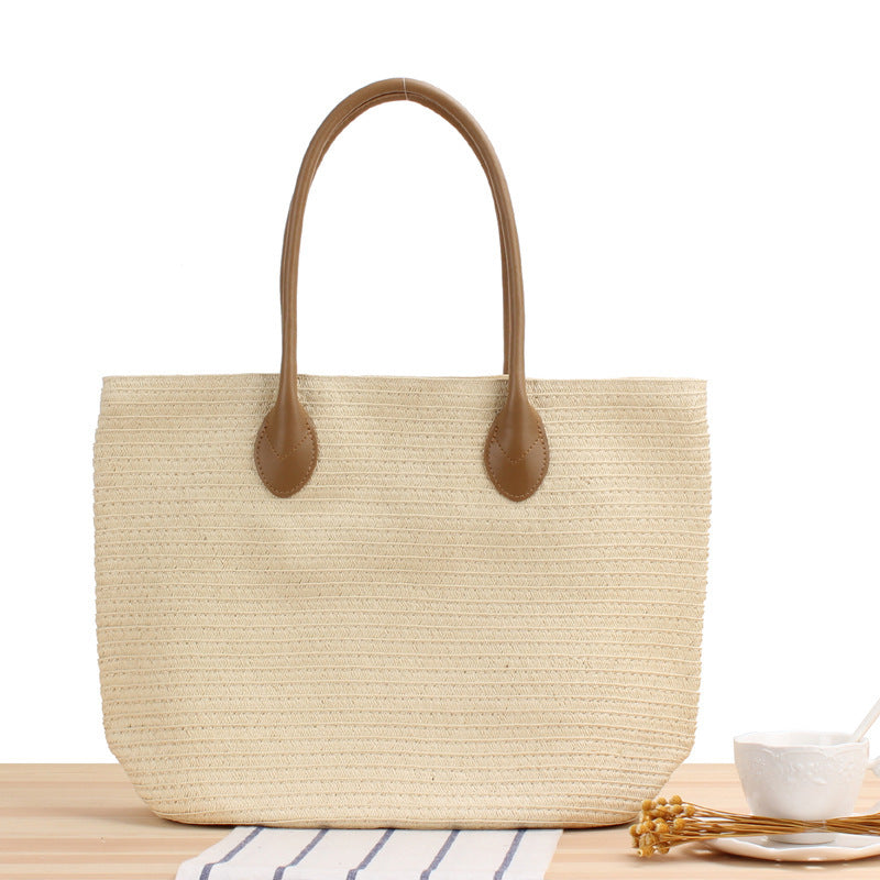 Spacious straw shopper with leather carrying handles Kalsten