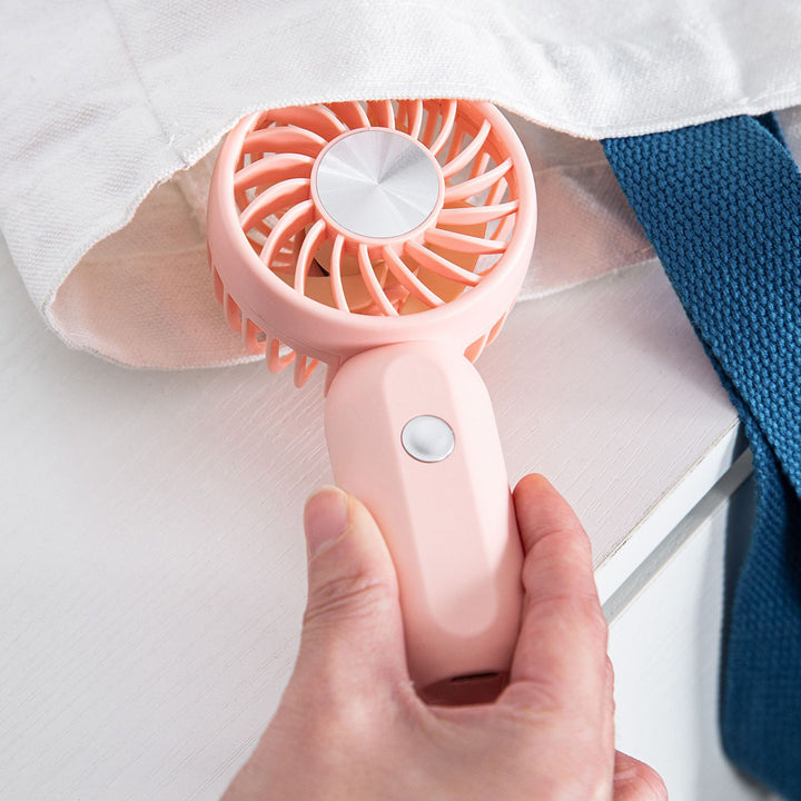 Women's portable mini fan with ergonomic grip technology Kalsten