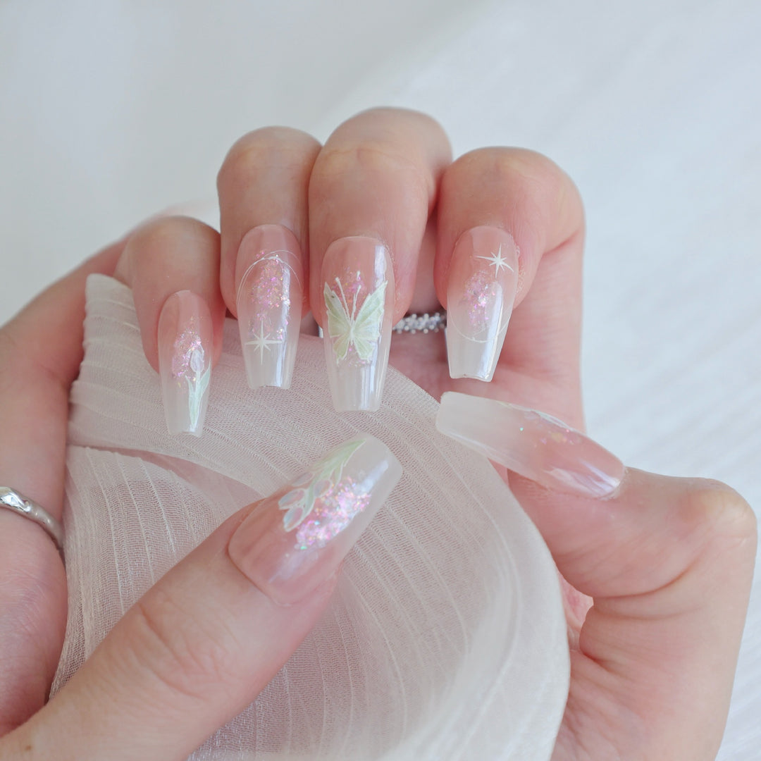 Artistic Press-On Nail Art Set with Heart and Celestial Designs