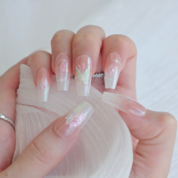 Artistic Press-On Nail Art Set with Heart and Celestial Designs
