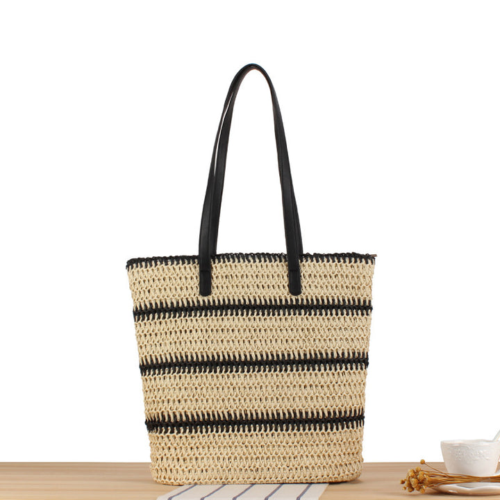 Fashionable beach bag made of woven natural material with elegant straps Kalsten