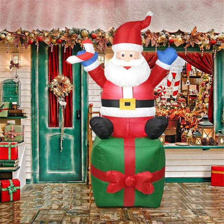 Inflatable Santa Claus decoration figure on gift package