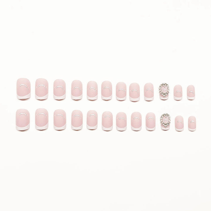Artificial nail set with elegant French design and rhinestone embellishments Kalsten