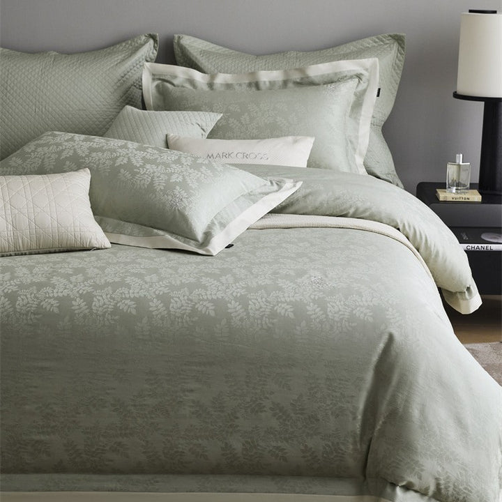 Premium duvet cover set with subtle jacquard structure and decorative ribbon Kalsten