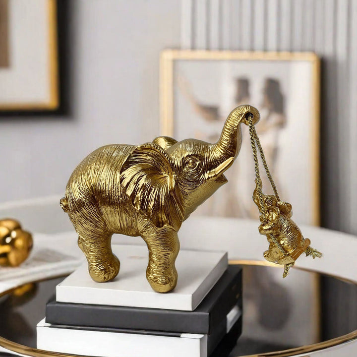 Decorative elephant figure with child Kalsten
