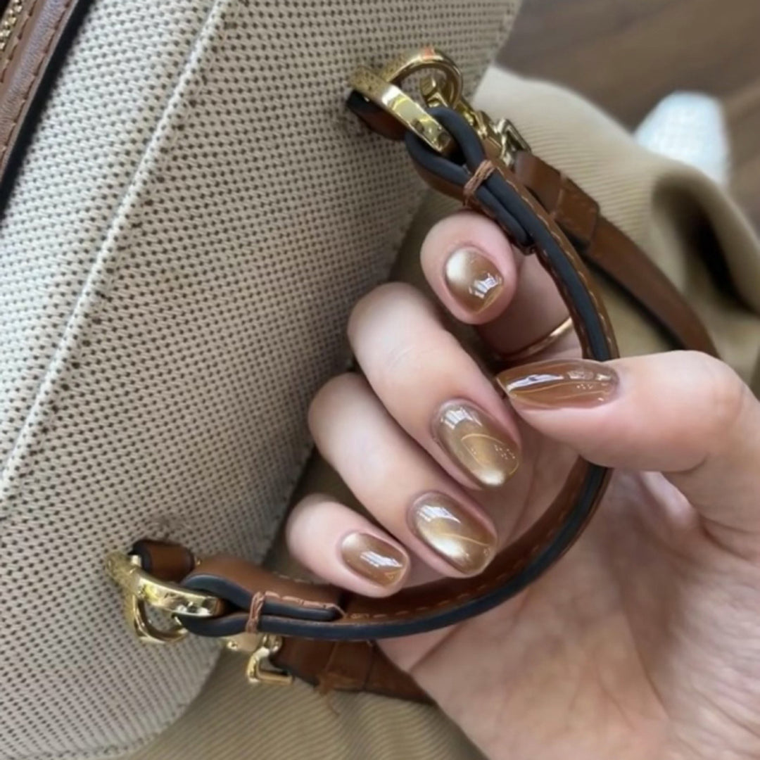 Elegant Nail Art with Glitter Decorations Kalsten
