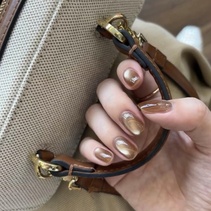 Elegant Nail Art with Glitter Decorations Kalsten