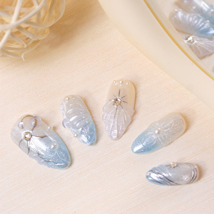 Artificial nail set with elegant shell and pearl accents Kalsten
