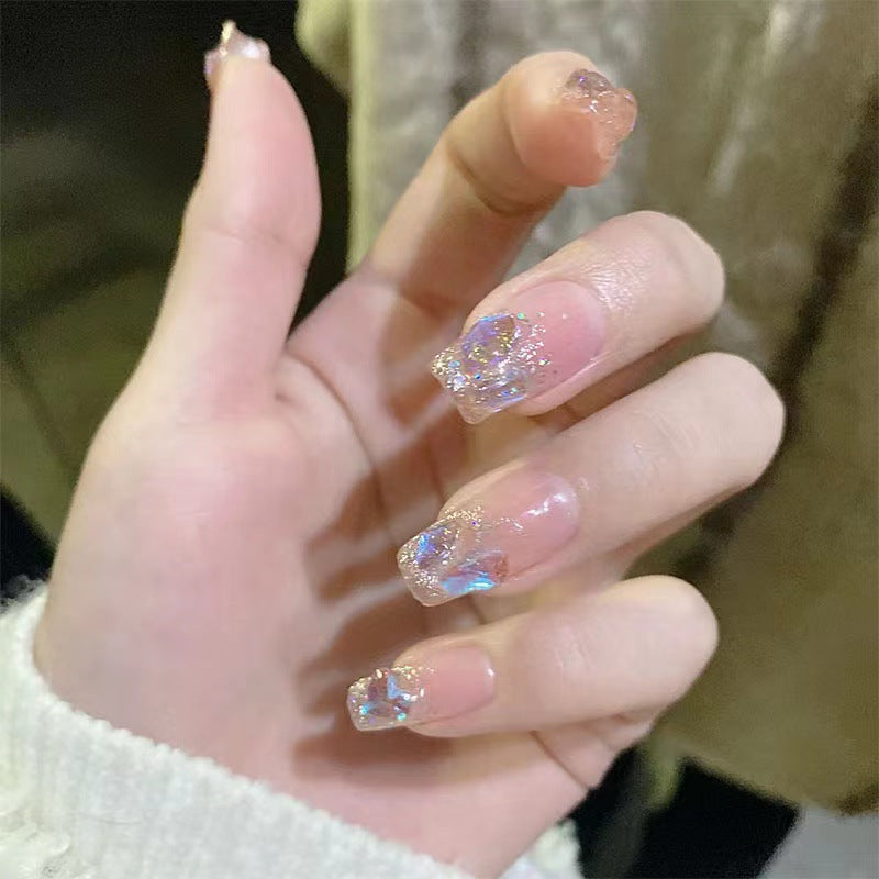 Artificial nails with heart accent and glamorous decorations Kalsten
