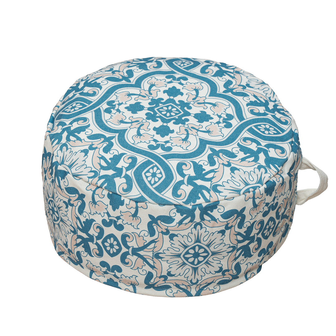 Round floor pouf with woven ornament pattern and carrying handle Kalsten