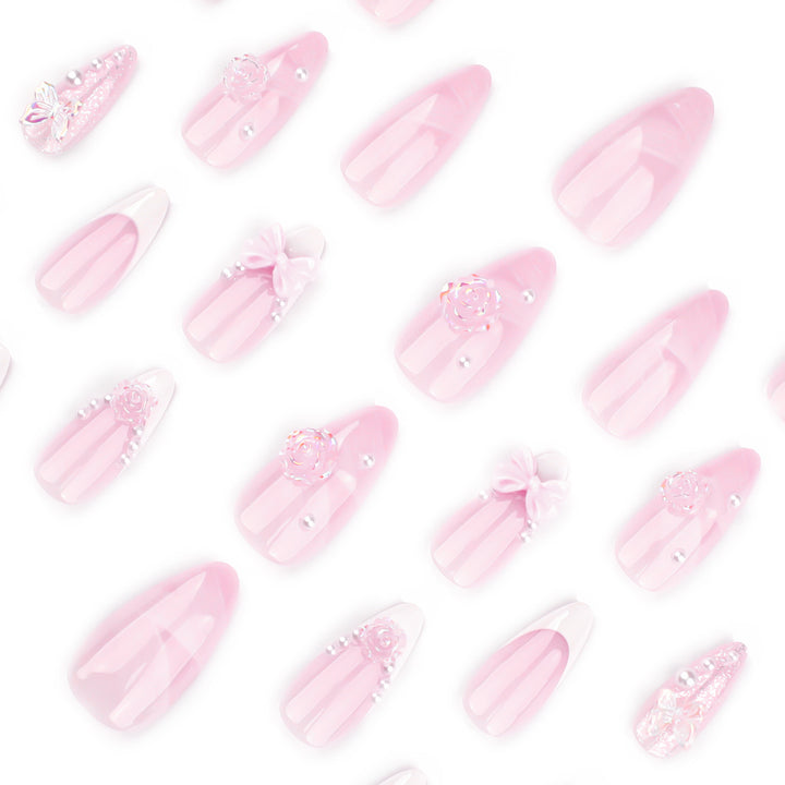 Artistic nail extensions with floral decorations and glitter accents Kalsten