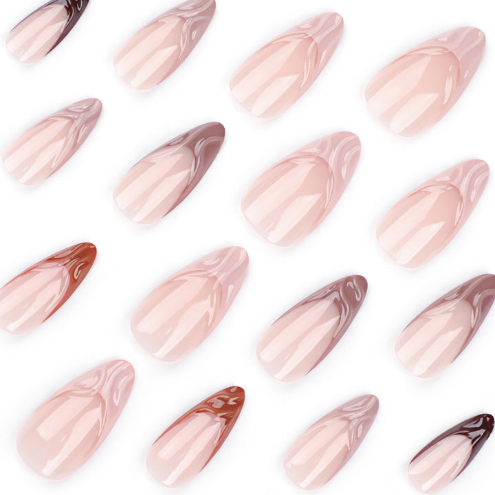 Artful stiletto nails with elegant gradient and glitter accents Kalsten