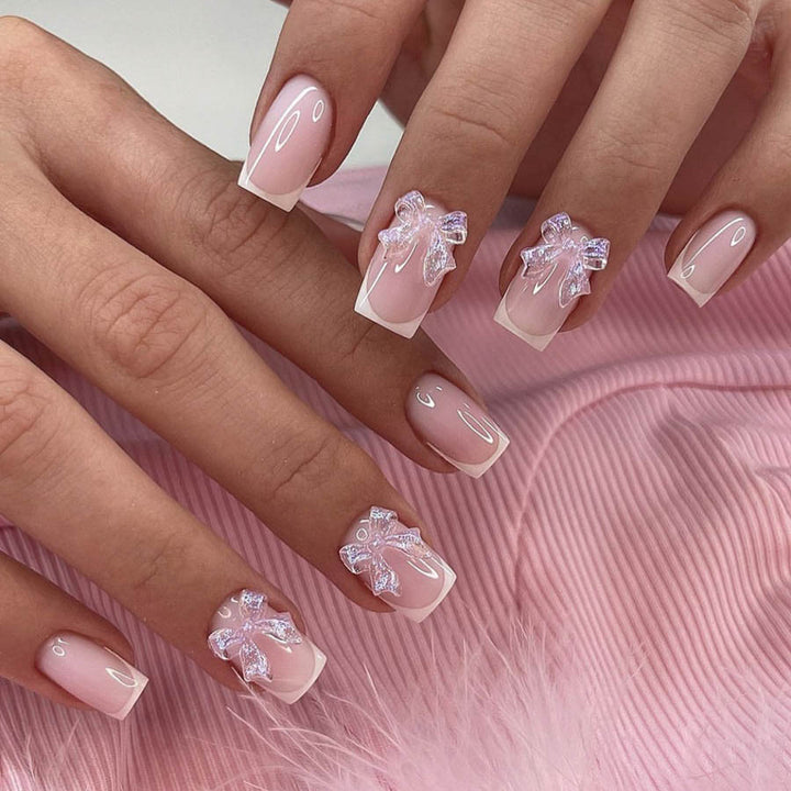 Acrylic nail set with elegant French tips and 3D details Kalsten