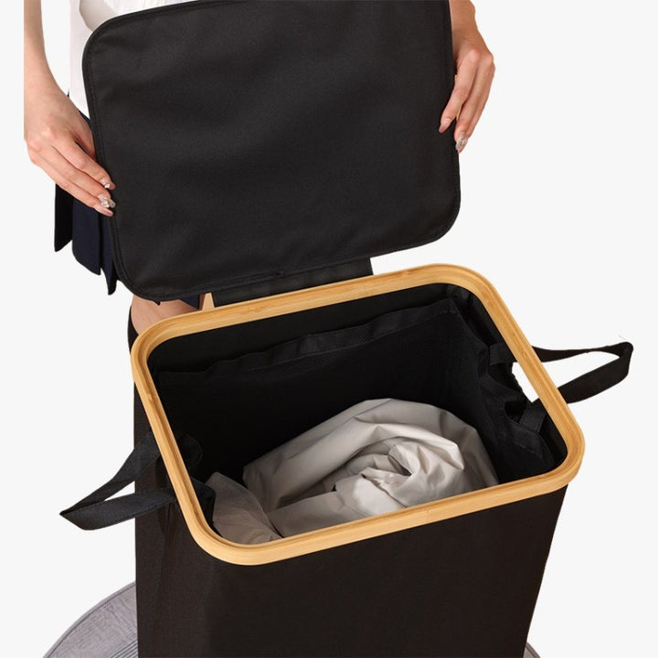 Elegant laundry container with practical lid and carrying system Kalsten