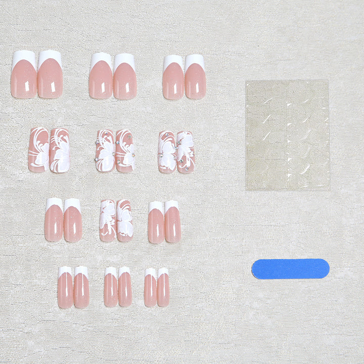 Artificial nails with floral embellishments and glitter details Kalsten