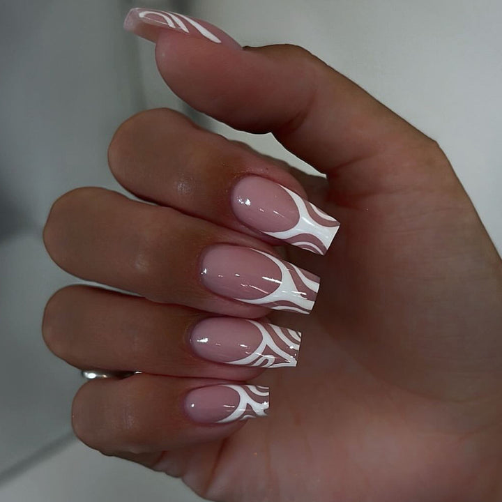 Artful nail extensions with translucent design and elegant lines Kalsten
