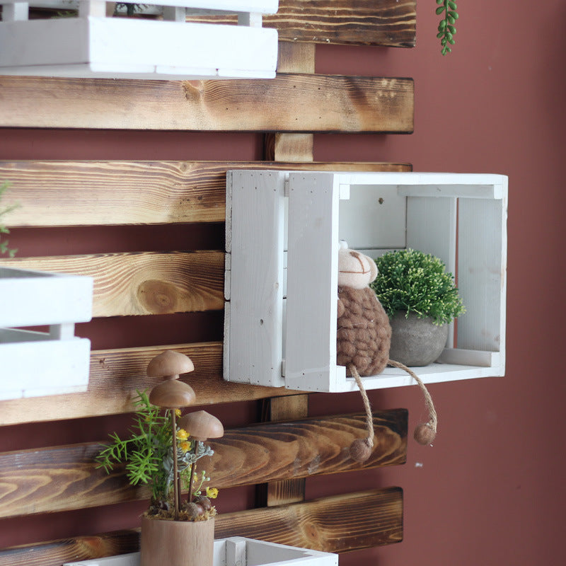 Wall shelf system with integrated storage boxes Kalsten