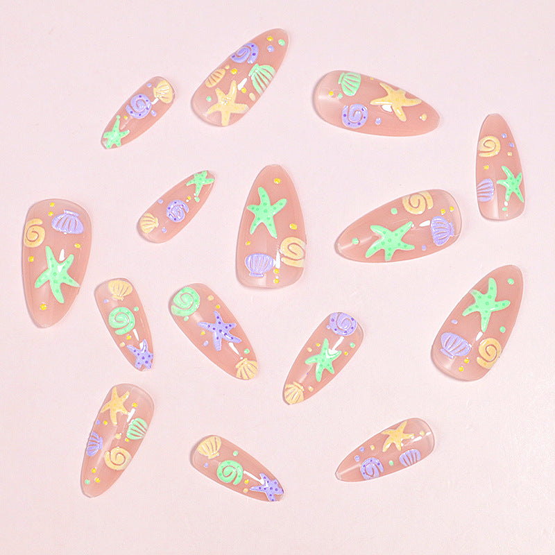 Artistic Press-On Nail Design with Ocean-Inspired Accents Kalsten