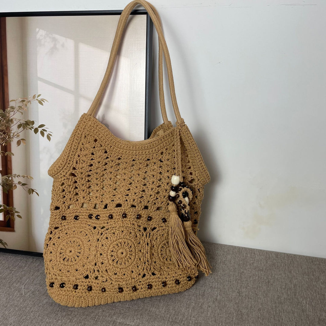 Hand-crocheted shoulder bag with unique fringe design Kalsten