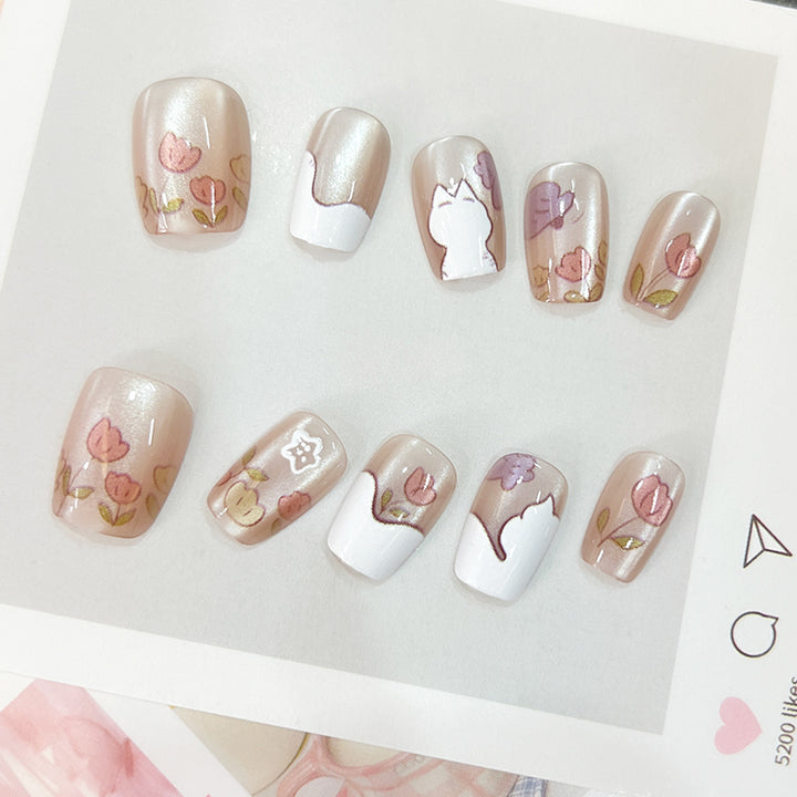 Artistic nail tips with floral motifs Kalsten