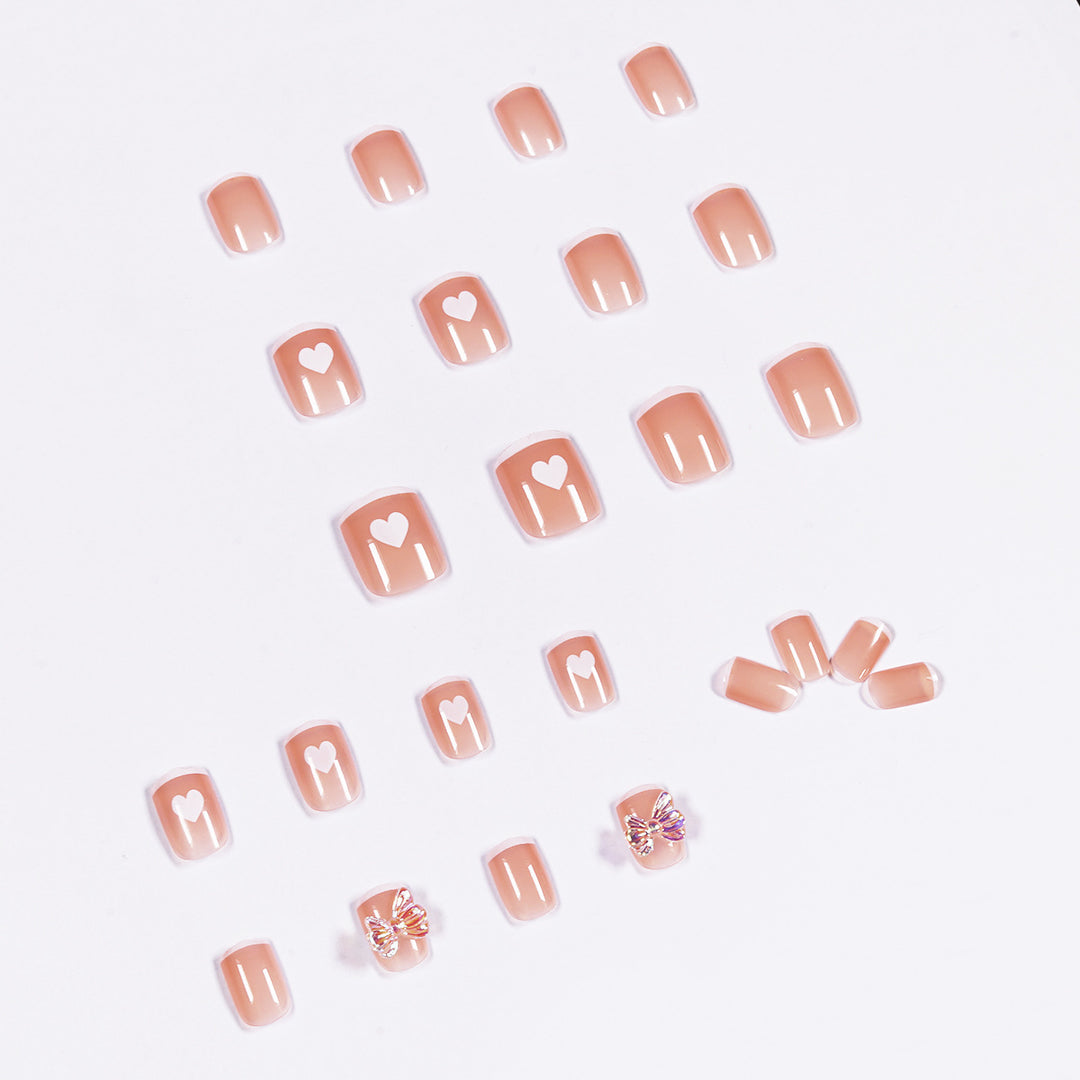 Nail art with heart and butterfly motifs Kalsten