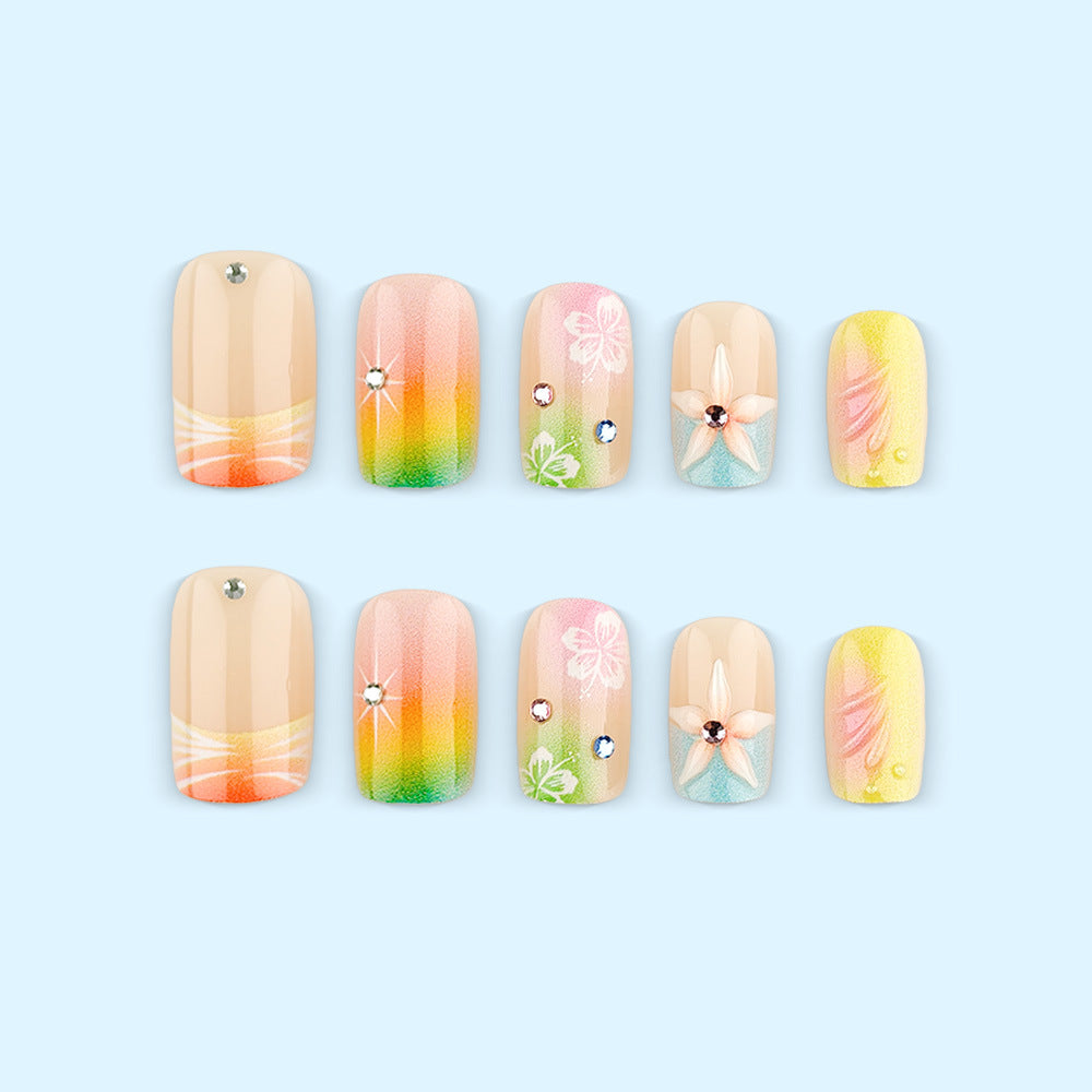 Artificial nails in vibrant floral design with glitter accents Kalsten