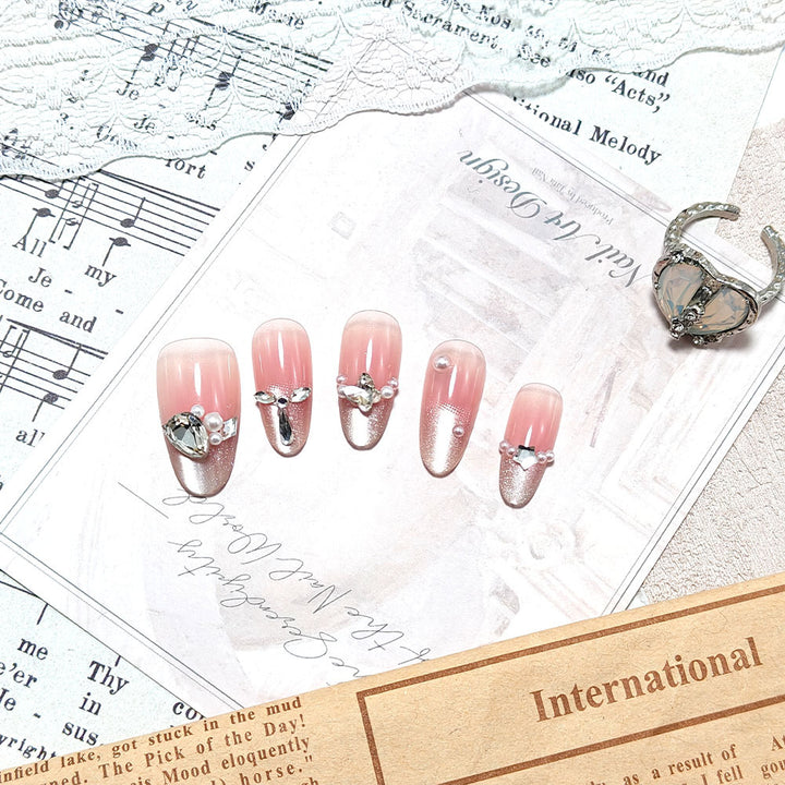 Artificial nails with luxurious jewelry accents Kalsten