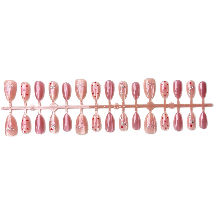 Nail art set with romantic hearts and elegant bows Kalsten