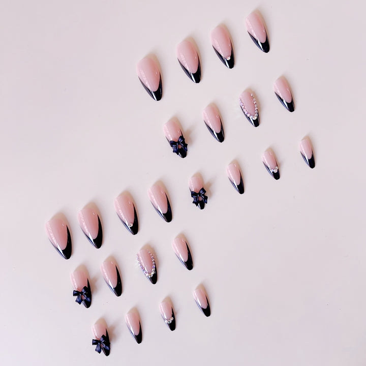 Artificial nail set with glamorous 3D bows and rhinestone embellishments Kalsten