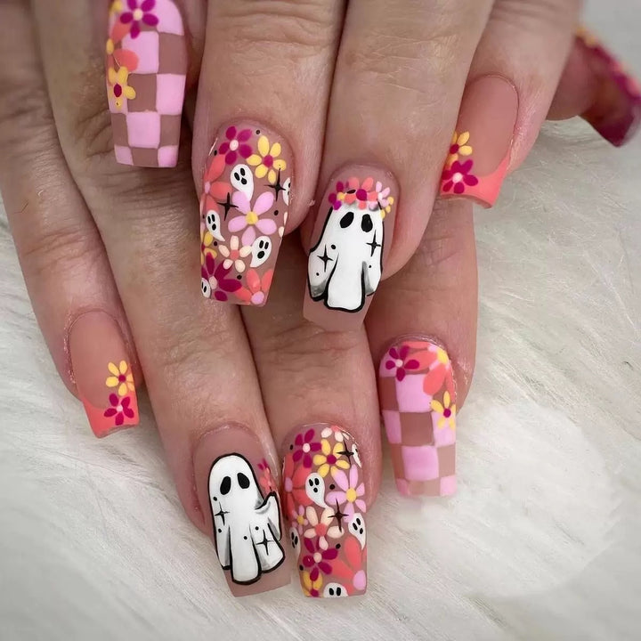 Artificial nail set with playful 3D designs and blooming patterns Kalsten