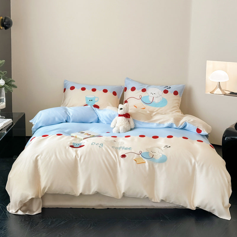 Reversible cotton bedding set with cute dog motif and polka dot border