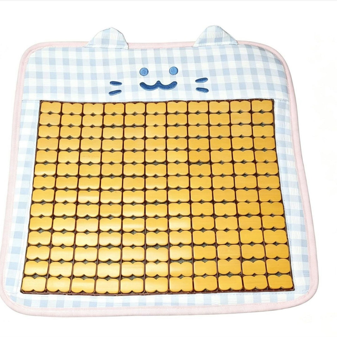 Padded seat cushion with massage stones and cat appliqué