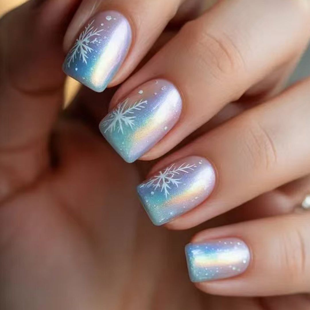 Wintry Artistic Nails with Shimmering Snowflake Design Kalsten