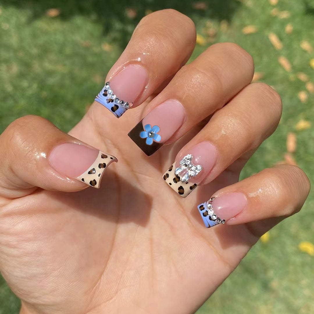 Artificial nails with stylish animal patterns and sparkling accents Kalsten