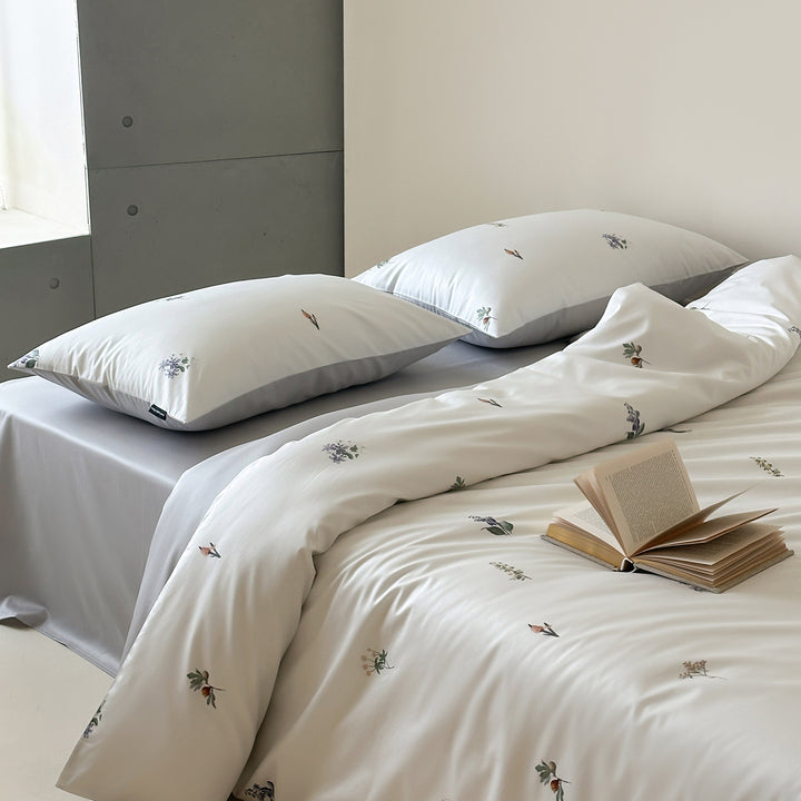Cotton satin duvet cover set with sketchy floral print and reversible satin